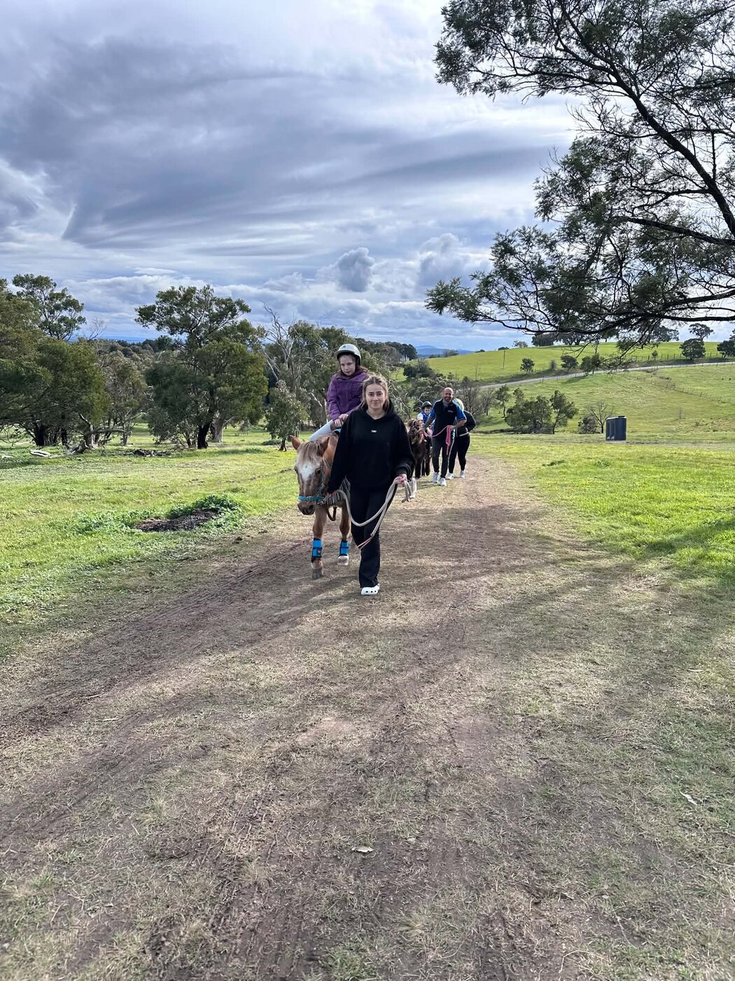 Little Riders ponies and handlers arriving for an outdoor experience